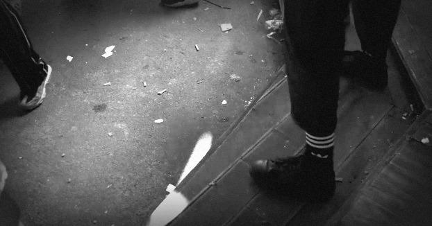 Black and white atmosphere image of a crowded venue floor